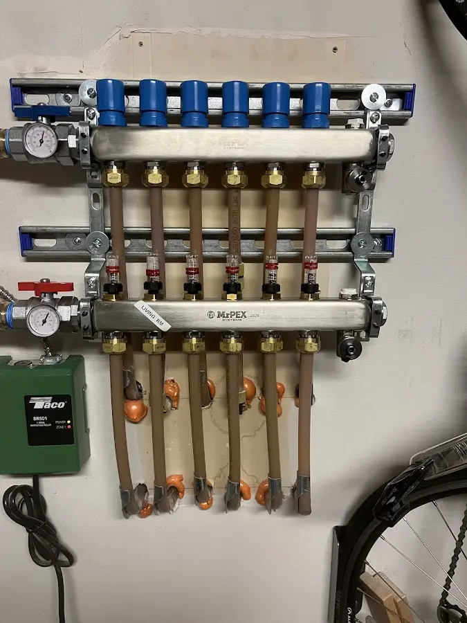 Plumber performing Gas Line Installation at a residential property in De Pere