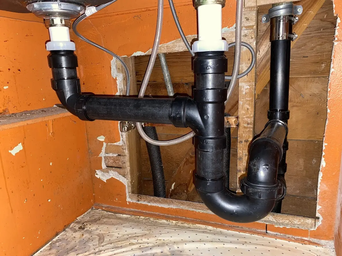 Professional Garbage Disposal Repair equipment and tools on the job in De Pere